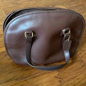 Brown leather Coach bag.